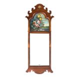 A GEORGIAN REVIVAL FRET FRAME WALL MIRROR,