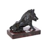 A 19TH CENTURY BRONZE GRAND TOUR MODEL OF A WILD BOAR, 7 1/2 ins long on a rouge marble base,