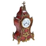 A 19TH CENTURY RED TORTOISESHELL AND ORMOLU MOUNTED MANTEL CLOCK, Japy Freres twin train movement,