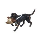A LATE 19TH CENTURY COLD PAINTED VIENESSE BRONZE OF A GUN DOG retrieving a duck, stamped AUSTRIA,