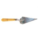 AN EDWARDIAN SILVER PRESENTATION FOUNDATION TROWEL with inscription, ivory handle, maker:- HA,