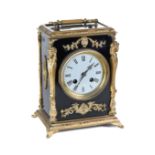 A 19TH CENTURY FRENCH EBONISED AND BRASS MOUNTED MANTEL CLOCK,