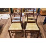 THREE EARLY 19TH CENTURY SHERATON PERIOD MAHOGANY DINING CHAIRS with reeded pierced splat backs and