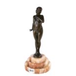 A 1920/30'S BRONZE ART DECO FIGURE OF A NUDE FEMALE, unsigned, raised on a stepped alabaster base,