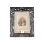 A LARGE ART NOUVEAU SILVER PHOTOGRAPH FRAME decorated with flower heads and tendrils, maker:- WN,