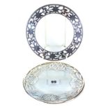 TWO VINTAGE CIRCULAR GLASS AND WHITE METAL OVERLAY COASTERS, each 7 ins diameter.