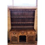 AN 18TH CENTURY OAK AND ELM DRESSER,