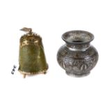 AN ANTIQUE GREEN HARDSTONE AND BRASS MOUNTED BELL SHAPED FLASK with screw in stopper,