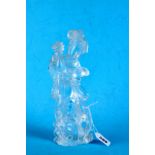 A LARGE CHINESE ROCK CRYSTAL CARVING OF GUANYIN, standing holding a vase of flowers,