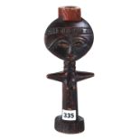 A 20TH CENTURY CARVED WOODEN ASHANTI TYPE FERTILITY FIGURE, 10 ins high.