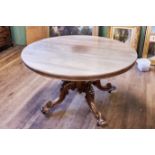 A GOOD VICTORIAN CIRCULAR MAHOGANY TILT TOP BREAKFAST TABLE raised on a squat vase turned column