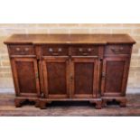 A GOOD QUALITY REPRODUCTION WALNUT BREAKFRONT SIDE CABINET,