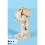 A JAPANESE MEIJI PERIOD IVORY OKIMONO of a man with a basket of fish on his back, signature to base,