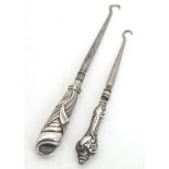 Two button hooks with silver plated handles (2) CONDITION: Please Note - we do not