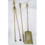 A set of brass fire tools CONDITION: Please Note - we do not make reference to the