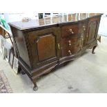 A sideboard CONDITION: Please Note - we do not make reference to the condition of