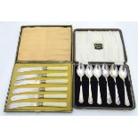 A cased set of 6 silver plated tea spoons together with 6 silver plated knives,
