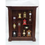 A clock display wall hanging unit with clocks CONDITION: Please Note - we do not