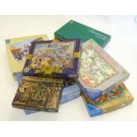 A quantity of Christmas jigsaws together with others