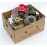 An assortment of Victorian and later oil lamps CONDITION: Please Note - we do not