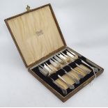 A cased set of silver plated cake forks CONDITION: Please Note - we do not make