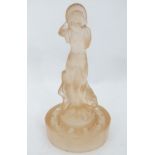 A peach glass figurine CONDITION: Please Note - we do not make reference to the