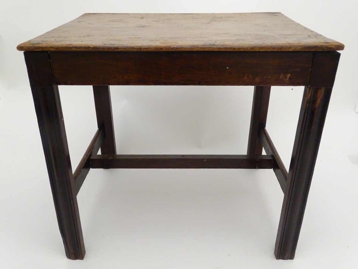 A late 18thC mahogany low table / stool with moulded legs and a chamfered frame,