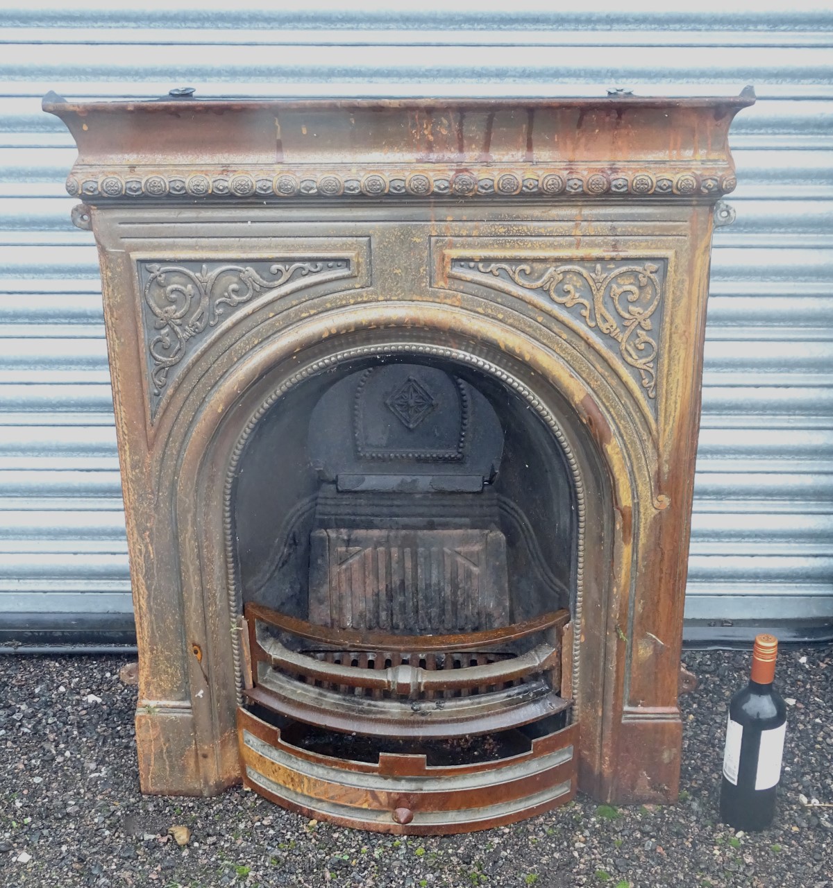 A modern cast iron fireplace CONDITION: Please Note - we do not make reference to