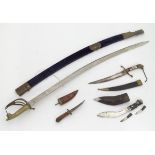 An Indian saber sword together with 3 other Eastern knives (4) CONDITION: Please