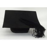 A mortar board hat by Christy's of London CONDITION: Please Note - we do not make