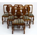 A set of six early / mid 20thC oak dining chairs,