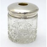 A cut glass jar / hair tidy with silver top hallmarked Birmingham 1924 maker Sanders & Mackenzie 3
