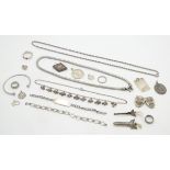 Assorted silver and white metal jewellery including necklaces, pendants,