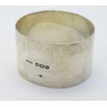 A silver napkin ring hallmarked Sheffield 1946 maker James Dixon & Sons Ltd.