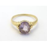 A large 14ct gold ring set with oval amethyst CONDITION: Please Note - we do not