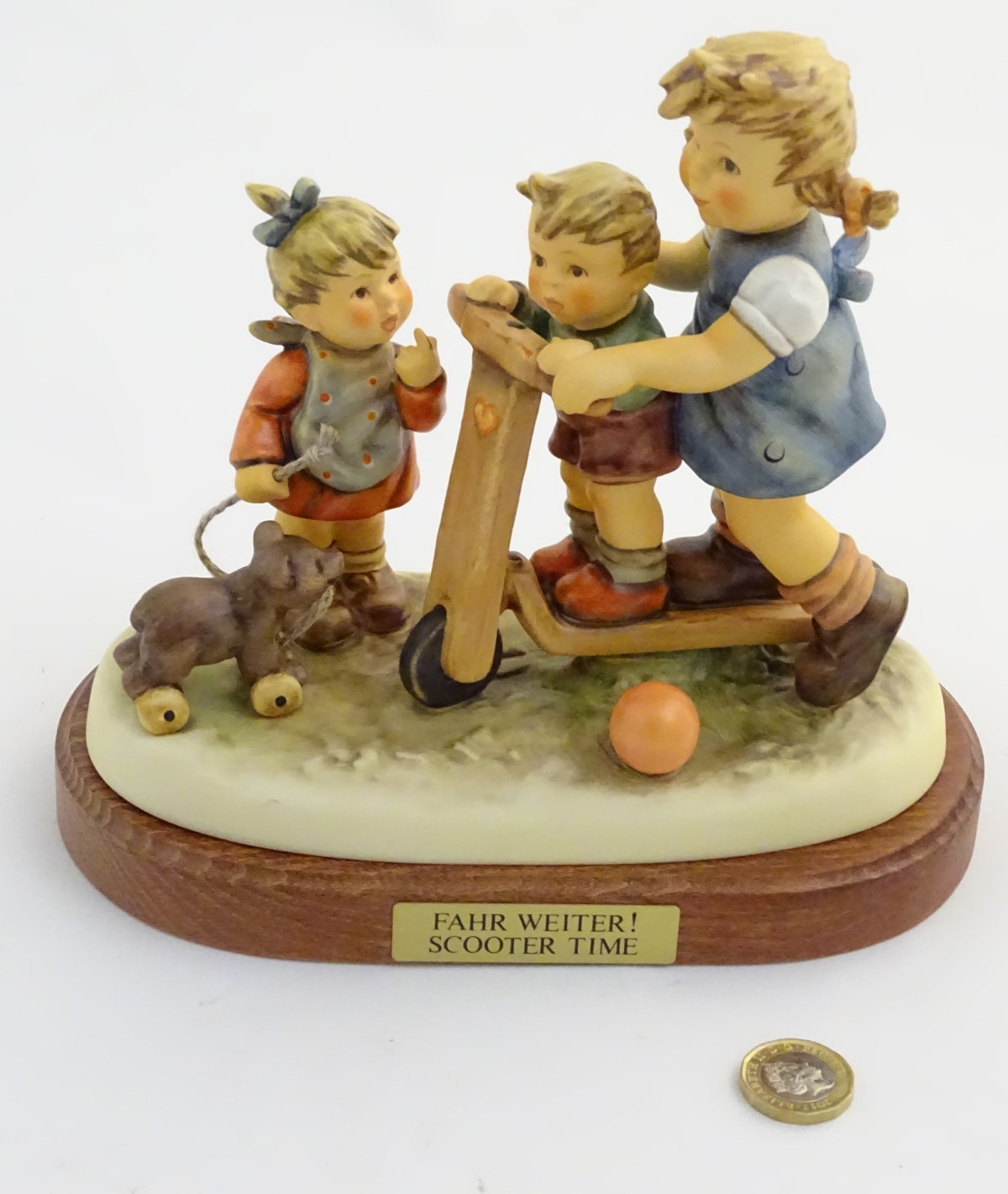 A large Hummel Goebel figural group, Scooter Time! (model no. 2070), on a titled wooden base. - Image 3 of 5