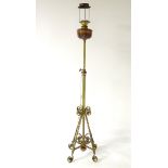 A 19thC brass telescopic standard lamp, formerly oil now converted to electricity,
