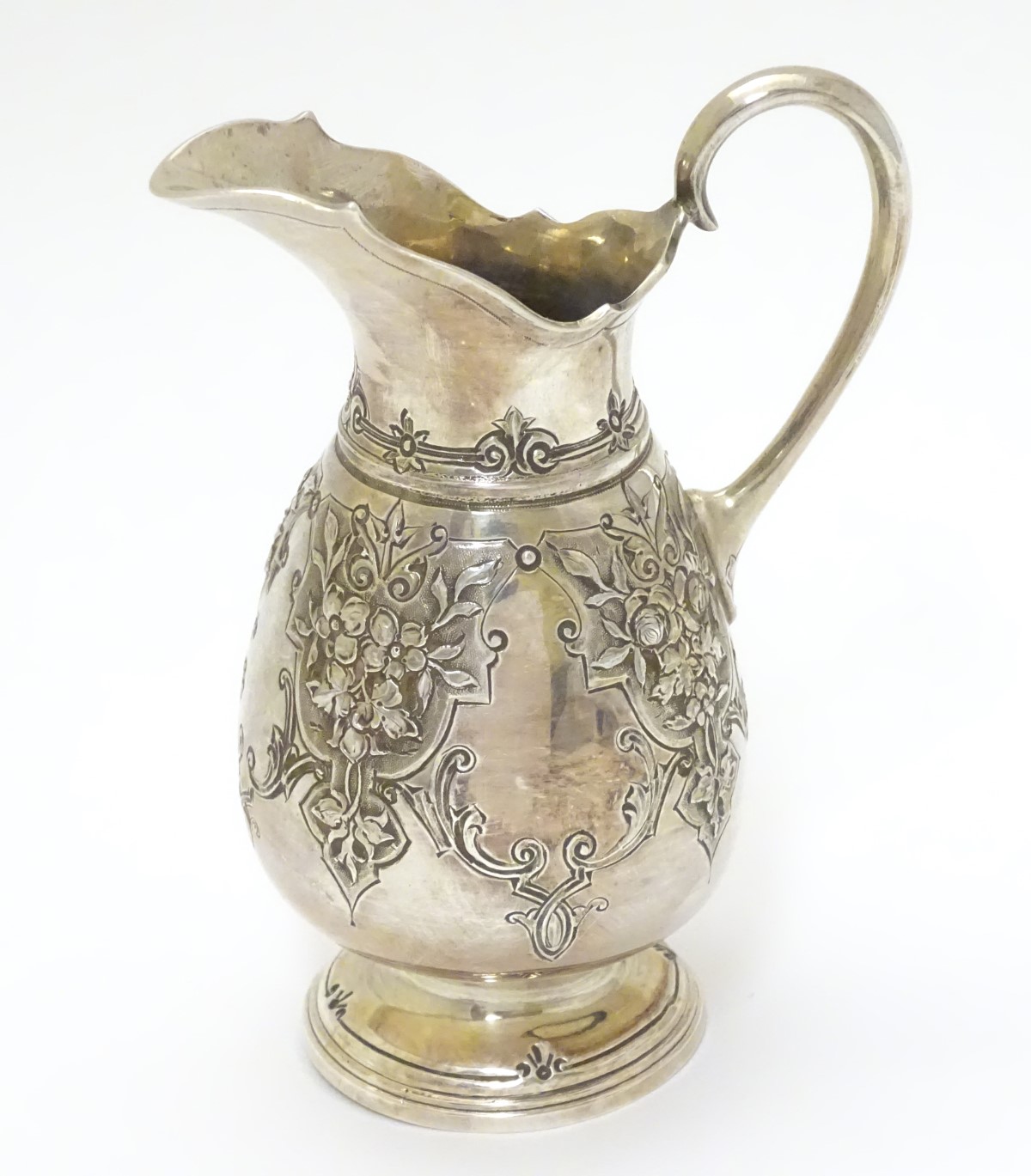 A Victorian silver cream jug hallmarked Sheffield 1870 maker Martin, Hall & Co. - Image 4 of 6