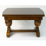 An early / mid 20thC oak draw leaf dining table,