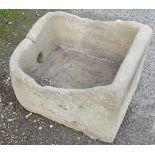 An 18thC sandstone trough with a hole to front. Approx.