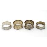 4 various silver napkin rings with engine turned and engraved decoration (4) CONDITION: