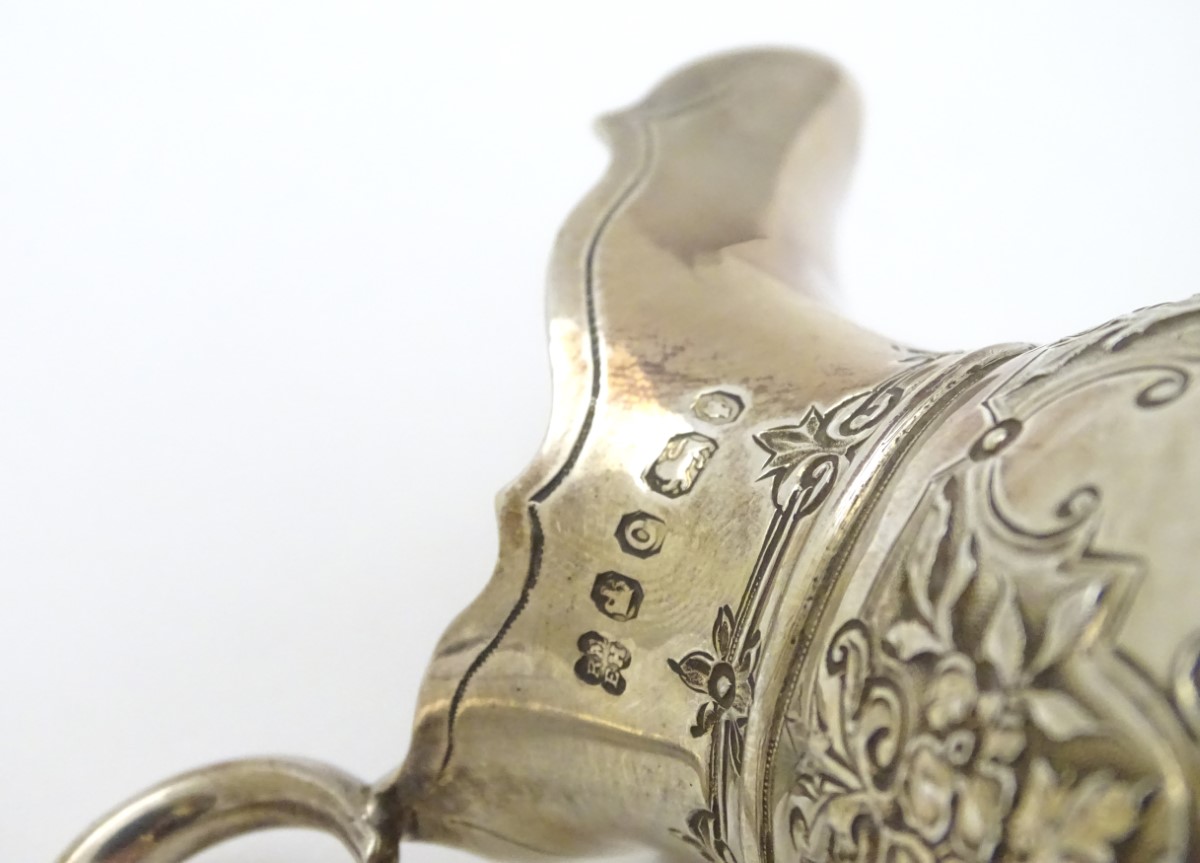 A Victorian silver cream jug hallmarked Sheffield 1870 maker Martin, Hall & Co. - Image 2 of 6