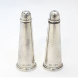 Silver salt and pepper pots of conical form. Hallmarked Sheffield 1978 maker AT Cannon Ltd.