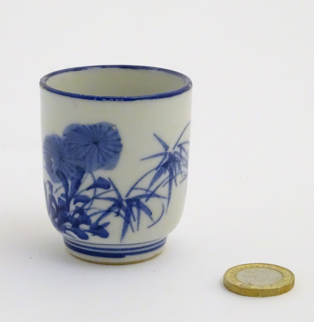 A Japanese blue and white pot with hand painted floral and foliate decoration. - Image 3 of 8