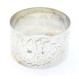 A Victorian silver napkin ring hallmarked Sheffield 1876 maker Atkin Brothers.