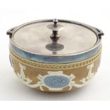 A Doulton Lambeth pot with a silver plate lid and swing handle,