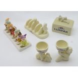 An assortment of late-20thC advertising ware for Lurpak butter, comprising two egg cups,