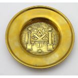 Freemasonry Interest: A brass dish decorated with Masonic symbols,