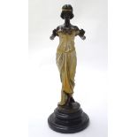 After Carlo Pittaluga, a 21stC cast sculpture of a female figure / classical maiden holding flowers,