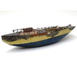 A 20thC wooden model boat with decorative metal mounts, entitled Stella Maris. Approx. 22" long.